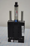 DLT-16M-A-C-50 /thruster Slide Model 1211M50 250PSI W/parker WW499206A/ Robohand. Fixed Price $287.55.