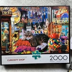 Buffalo Games Curiosity Shop - Complete 2000 Piece Jigsaw Puzzle Cat/dog/robot. Fixed Price $19.99.