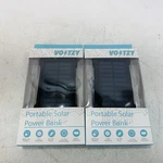 Pack Voltzy Portable Solar Power Bank 8000MAH 2X Usb, Ic Chip, Water Resistant. Fixed Price $27.58.