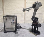 Yaskawa YR-UP50-A02 Robot W/ Yasnac Xrc ERCR-UP50-RB00 Controller Cabinet. Fixed Price $5900.00.